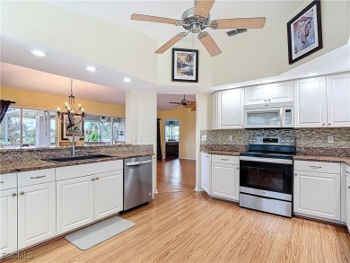 This well-maintained Villareal model home sits directly on the on Herons Glen Golf and Country Club in Florida - for sale on GolfHomes.com, golf home, golf lot