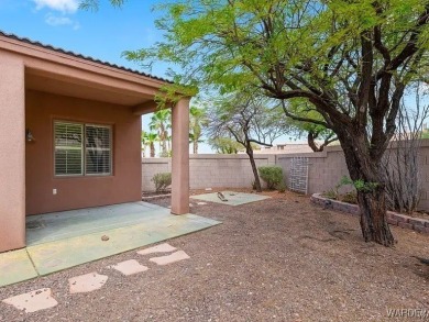 Experience the perfect blend of modern comfort and resort-style on Laughlin Ranch Golf Club in Arizona - for sale on GolfHomes.com, golf home, golf lot