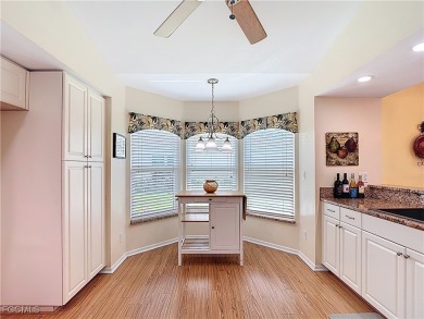 This well-maintained Villareal model home sits directly on the on Herons Glen Golf and Country Club in Florida - for sale on GolfHomes.com, golf home, golf lot