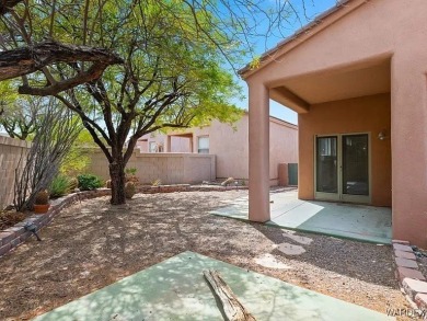 Experience the perfect blend of modern comfort and resort-style on Laughlin Ranch Golf Club in Arizona - for sale on GolfHomes.com, golf home, golf lot