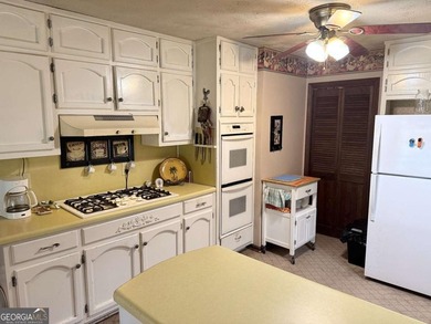 Welcome to sought-after Honey Creek Country Club, where on Honey Creek Country Club in Georgia - for sale on GolfHomes.com, golf home, golf lot