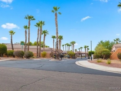 Experience the perfect blend of modern comfort and resort-style on Laughlin Ranch Golf Club in Arizona - for sale on GolfHomes.com, golf home, golf lot