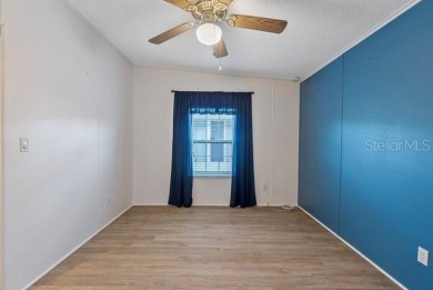 What an awesome home with an Island vibe.   TRIPLE WIDE 3 on Fairway Village Golf Course in Florida - for sale on GolfHomes.com, golf home, golf lot