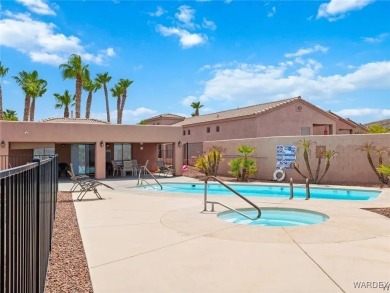 Experience the perfect blend of modern comfort and resort-style on Laughlin Ranch Golf Club in Arizona - for sale on GolfHomes.com, golf home, golf lot