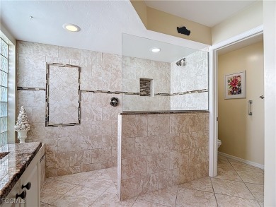 This well-maintained Villareal model home sits directly on the on Herons Glen Golf and Country Club in Florida - for sale on GolfHomes.com, golf home, golf lot