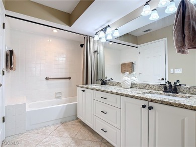 This well-maintained Villareal model home sits directly on the on Herons Glen Golf and Country Club in Florida - for sale on GolfHomes.com, golf home, golf lot