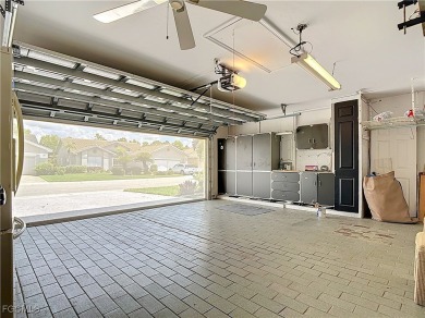 This well-maintained Villareal model home sits directly on the on Herons Glen Golf and Country Club in Florida - for sale on GolfHomes.com, golf home, golf lot