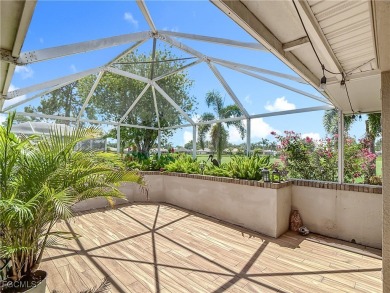 This well-maintained Villareal model home sits directly on the on Herons Glen Golf and Country Club in Florida - for sale on GolfHomes.com, golf home, golf lot