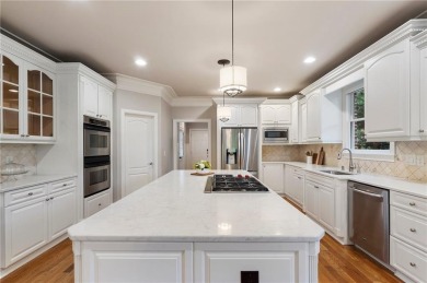 Experience luxury living at its finest in this stunning on Alpharetta Athletic Club East in Georgia - for sale on GolfHomes.com, golf home, golf lot