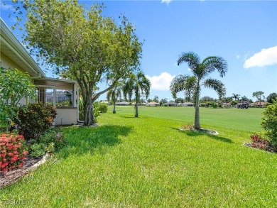 This well-maintained Villareal model home sits directly on the on Herons Glen Golf and Country Club in Florida - for sale on GolfHomes.com, golf home, golf lot