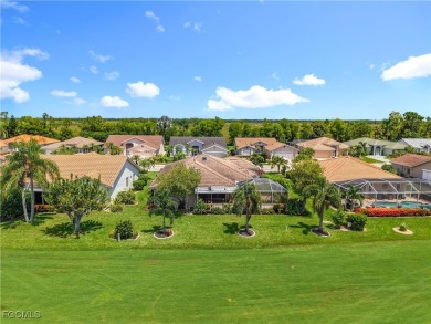 This well-maintained Villareal model home sits directly on the on Herons Glen Golf and Country Club in Florida - for sale on GolfHomes.com, golf home, golf lot