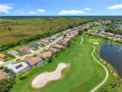 This well-maintained Villareal model home sits directly on the on Herons Glen Golf and Country Club in Florida - for sale on GolfHomes.com, golf home, golf lot