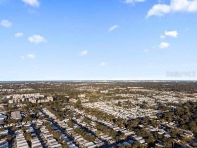 What an awesome home with an Island vibe.   TRIPLE WIDE 3 on Fairway Village Golf Course in Florida - for sale on GolfHomes.com, golf home, golf lot