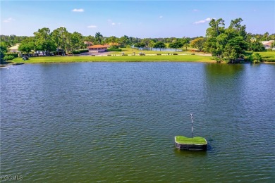 This well-maintained Villareal model home sits directly on the on Herons Glen Golf and Country Club in Florida - for sale on GolfHomes.com, golf home, golf lot