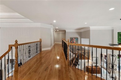 Experience luxury living at its finest in this stunning on Alpharetta Athletic Club East in Georgia - for sale on GolfHomes.com, golf home, golf lot
