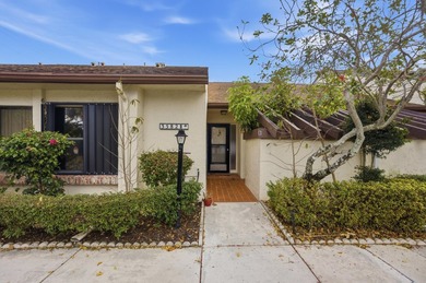 Move-in ready in a desirable 55+ community! Conveniently located on Palm Beach National Golf and Country Club in Florida - for sale on GolfHomes.com, golf home, golf lot