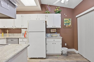 Move-in ready in a desirable 55+ community! Conveniently located on Palm Beach National Golf and Country Club in Florida - for sale on GolfHomes.com, golf home, golf lot