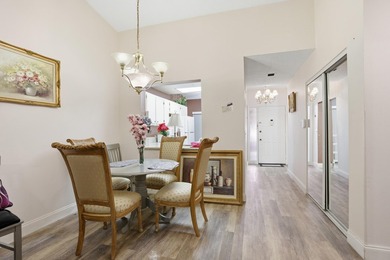 Move-in ready in a desirable 55+ community! Conveniently located on Palm Beach National Golf and Country Club in Florida - for sale on GolfHomes.com, golf home, golf lot