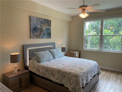 This is a true gem nestled on a golf course between Marco Island on Hammock Bay in Florida - for sale on GolfHomes.com, golf home, golf lot