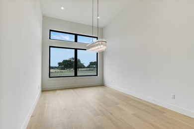 Perfectly positioned on the 17th hole of Summit Rock, this new on Summit Rock Golf Course in Texas - for sale on GolfHomes.com, golf home, golf lot