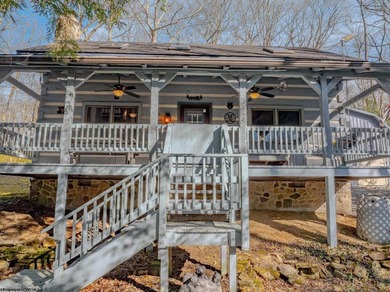Welcome to Bear's Den, a beautiful Hearthstone LOG CABIN located on Alpine Lake Resort in West Virginia - for sale on GolfHomes.com, golf home, golf lot