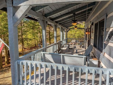 Welcome to Bear's Den, a beautiful Hearthstone LOG CABIN located on Alpine Lake Resort in West Virginia - for sale on GolfHomes.com, golf home, golf lot