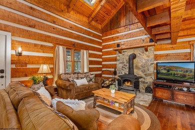 Welcome to Bear's Den, a beautiful Hearthstone LOG CABIN located on Alpine Lake Resort in West Virginia - for sale on GolfHomes.com, golf home, golf lot