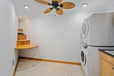 Enjoy some of the BEST VIEWS from this SPACIOUS GOLF-FRONT VILLA on Wedgefield Golf Club in Florida - for sale on GolfHomes.com, golf home, golf lot