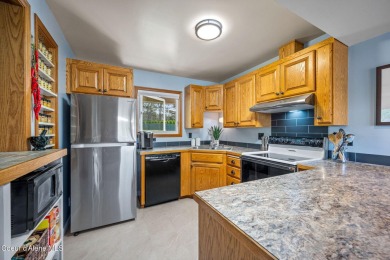 Live the active CDA lifestyle--steps from golf, beaches, and on Coeur D Alene Resort Golf Course in Idaho - for sale on GolfHomes.com, golf home, golf lot