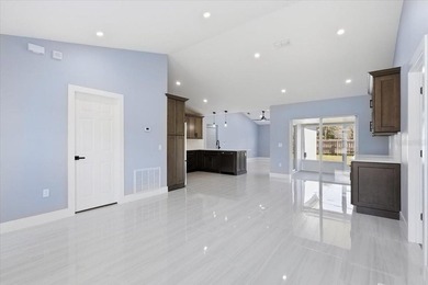 Better Than New and exceptionally upgraded, this stunning home on The Grand Club Cypress Course in Florida - for sale on GolfHomes.com, golf home, golf lot