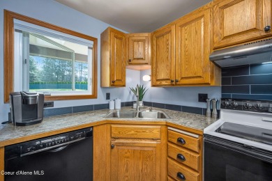Live the active CDA lifestyle--steps from golf, beaches, and on Coeur D Alene Resort Golf Course in Idaho - for sale on GolfHomes.com, golf home, golf lot