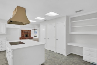 Freshly updated and move-in ready! This 3-bed, 2-bath home in on Hide-A-Way Lake Golf Course in Texas - for sale on GolfHomes.com, golf home, golf lot