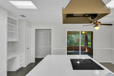 Freshly updated and move-in ready! This 3-bed, 2-bath home in on Hide-A-Way Lake Golf Course in Texas - for sale on GolfHomes.com, golf home, golf lot