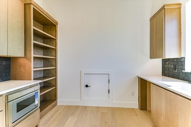 This newly constructed contemporary residence in Tuscan Village on Summit Rock Golf Course in Texas - for sale on GolfHomes.com, golf home, golf lot