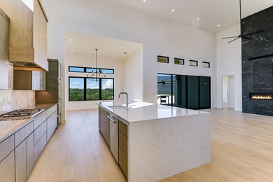 This newly constructed contemporary residence in Tuscan Village on Summit Rock Golf Course in Texas - for sale on GolfHomes.com, golf home, golf lot