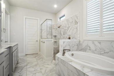 Experience resort-style living in this stunning 4-bedroom, 2 on The Golf Club at Resort Eagle Mountain Lake in Texas - for sale on GolfHomes.com, golf home, golf lot