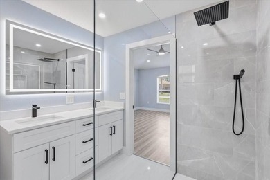 Better Than New and exceptionally upgraded, this stunning home on The Grand Club Cypress Course in Florida - for sale on GolfHomes.com, golf home, golf lot