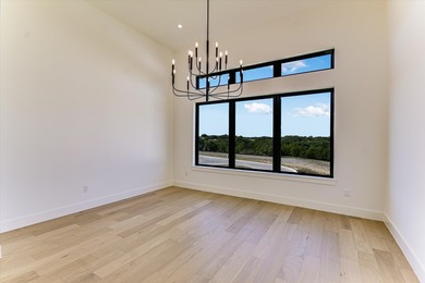 This newly constructed contemporary residence in Tuscan Village on Summit Rock Golf Course in Texas - for sale on GolfHomes.com, golf home, golf lot