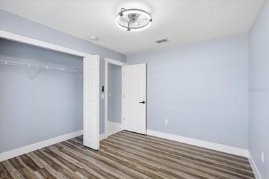 Better Than New and exceptionally upgraded, this stunning home on The Grand Club Cypress Course in Florida - for sale on GolfHomes.com, golf home, golf lot