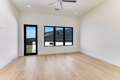 This newly constructed contemporary residence in Tuscan Village on Summit Rock Golf Course in Texas - for sale on GolfHomes.com, golf home, golf lot