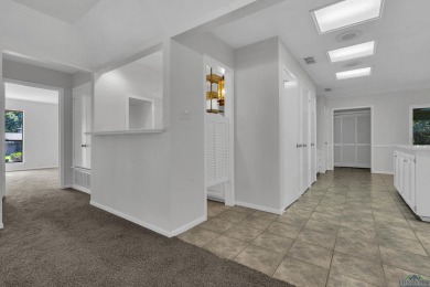Freshly updated and move-in ready! This 3-bed, 2-bath home in on Hide-A-Way Lake Golf Course in Texas - for sale on GolfHomes.com, golf home, golf lot