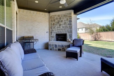 Experience resort-style living in this stunning 4-bedroom, 2 on The Golf Club at Resort Eagle Mountain Lake in Texas - for sale on GolfHomes.com, golf home, golf lot