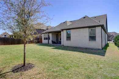 Experience resort-style living in this stunning 4-bedroom, 2 on The Golf Club at Resort Eagle Mountain Lake in Texas - for sale on GolfHomes.com, golf home, golf lot