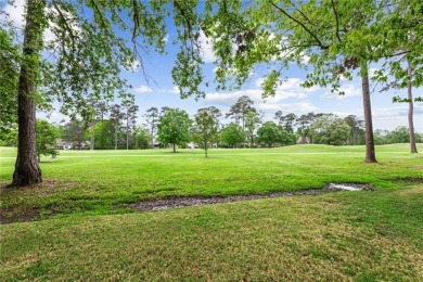 Timeless Beau Chene Home on 14th fairway of Magnolia Course on Beau Chene Country Club in Louisiana - for sale on GolfHomes.com, golf home, golf lot
