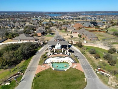 Experience resort-style living in this stunning 4-bedroom, 2 on The Golf Club at Resort Eagle Mountain Lake in Texas - for sale on GolfHomes.com, golf home, golf lot