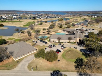 Experience resort-style living in this stunning 4-bedroom, 2 on The Golf Club at Resort Eagle Mountain Lake in Texas - for sale on GolfHomes.com, golf home, golf lot