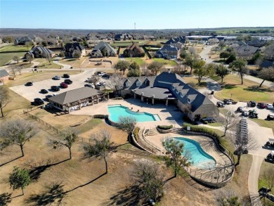 Experience resort-style living in this stunning 4-bedroom, 2 on The Golf Club at Resort Eagle Mountain Lake in Texas - for sale on GolfHomes.com, golf home, golf lot