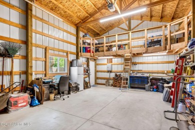 Live the active CDA lifestyle--steps from golf, beaches, and on Coeur D Alene Resort Golf Course in Idaho - for sale on GolfHomes.com, golf home, golf lot