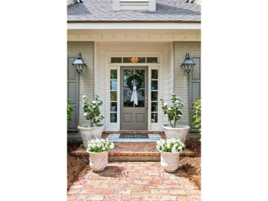 Timeless Beau Chene Home on 14th fairway of Magnolia Course on Beau Chene Country Club in Louisiana - for sale on GolfHomes.com, golf home, golf lot