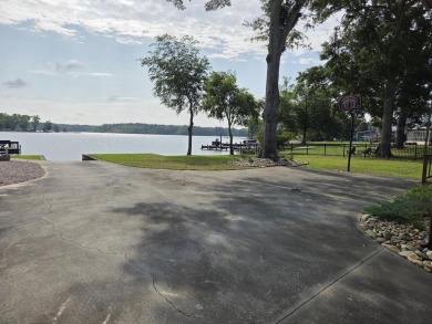 Deepwater lakefront home at Taw Caw Creek on Lake Marione view on Foxboro Golf Club in South Carolina - for sale on GolfHomes.com, golf home, golf lot